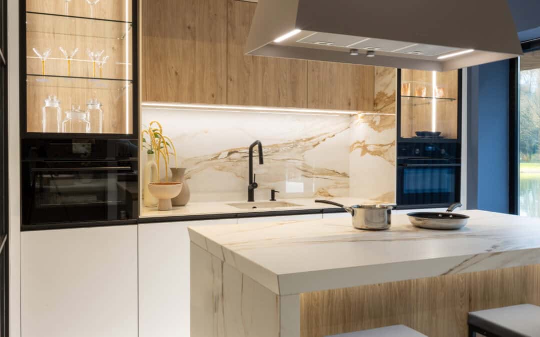 Reforma integral de vivienda en Madrid: nueva cocina moderna y redistribución para crear un dormitorio principal amplio.
